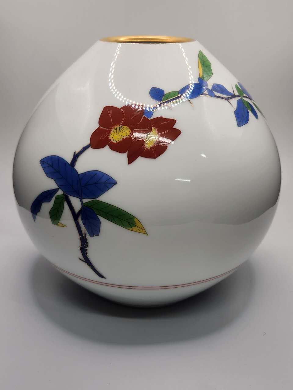 Hand-Painted Floral Porcelain Vase with Gilded Rim