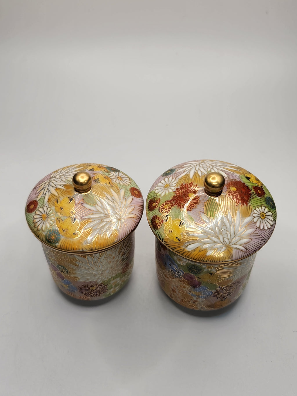 Kutani Ware Hand-Painted Gilded Lidded Tea Cup Pair